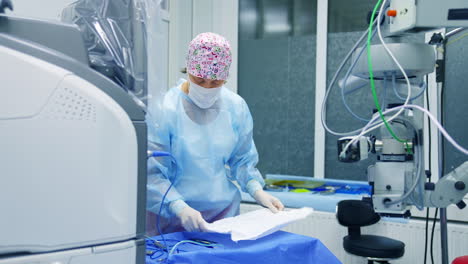 doctor preparing eye vision surgery. portrait of surgeon in operating room with surgical microscope