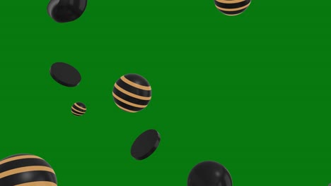cayendo bolas de rayas negras y doradas en un fondo verde
