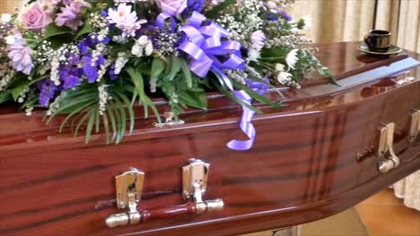 closeup-shot-of-a-funeral-casket-in-a-hearse-or-chapel-or-burial-at-cemetery