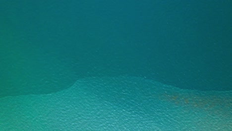 4k aerial view of drone move on beautiful sea. flight over ocean, open sea. dynamic aerial shot.