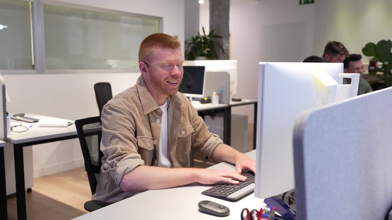 Man working at computer in modern office