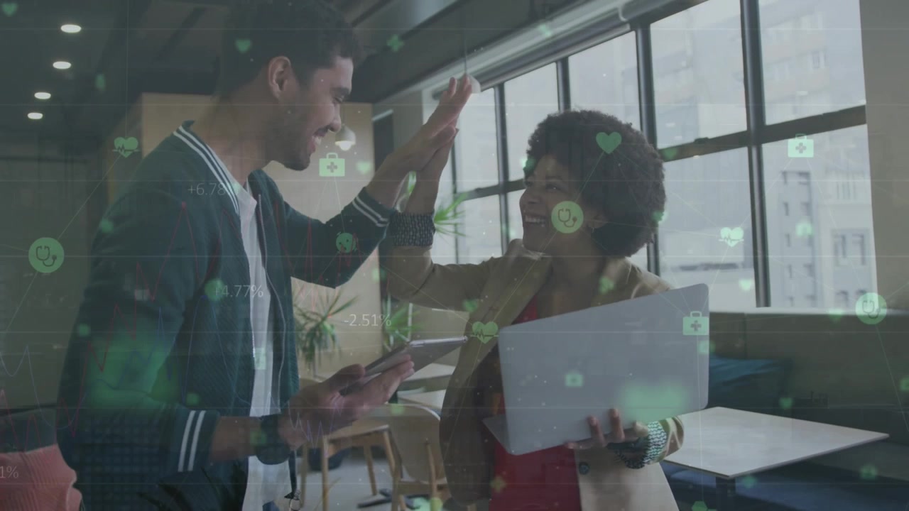 Animation of data processing with icons over diverse business people at office