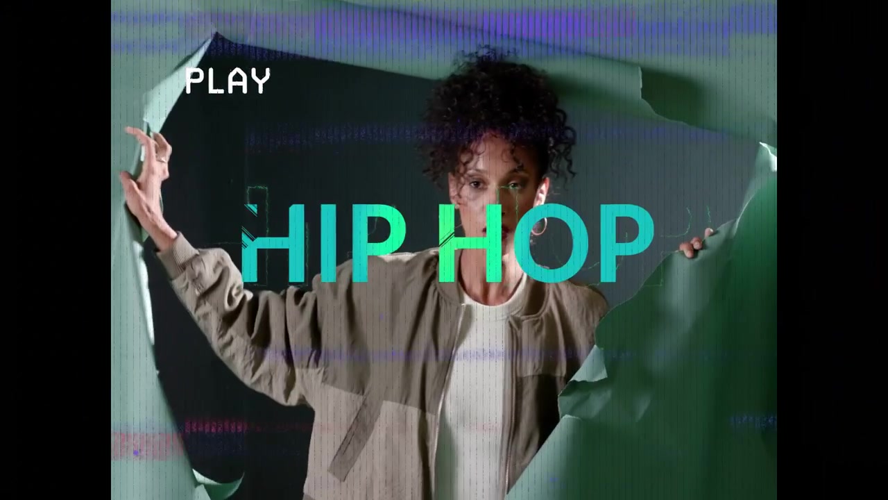 Woman reacting to central rupture, pushing through green paper, revealing black void for HIP HOP ad