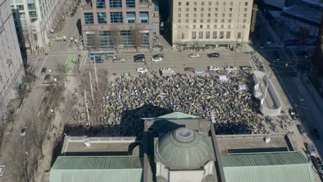 supporters of ukraine and anti-war demonstrators gathered outside the vancouver art gallery to protest russia's violent invasion of ukraine