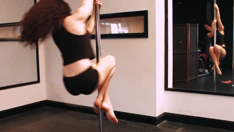 Pole-dancer-practicing-pole-dance