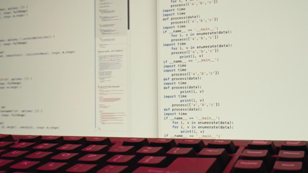 Close-Up of Hand Typing Code on a Computer Keyboard