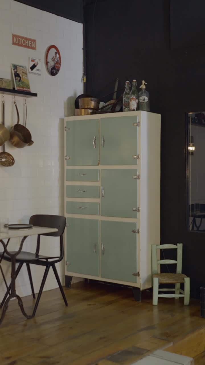Vintage Kitchen Interior with Retro Cabinet and Dining Area