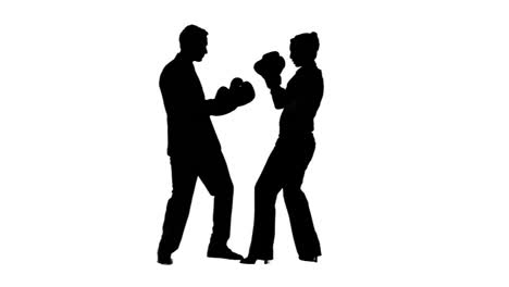 two colleagues in slow motion boxing