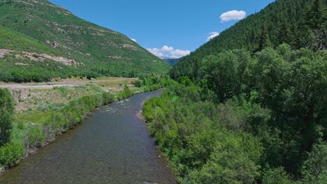 flying along the slate river near crested butte mountain, colorado, usa