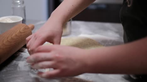 preparing the dough for sweet desserts in patisserie kitchen behind the scenes