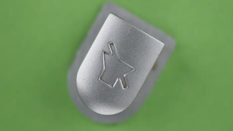 rotation, button with the mute sound symbol. crossed speaker icon. top view. isolated