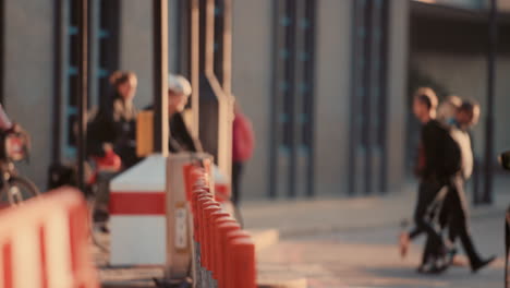 Anonymous-crowd-of-people-walking-cycling-bicycles-commuters-London-City-street-slow-motion