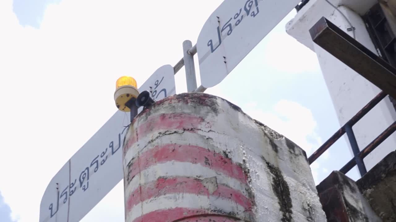 POV shot of boat sign along Chao Phraya River in the day in Bangkok, Thailand