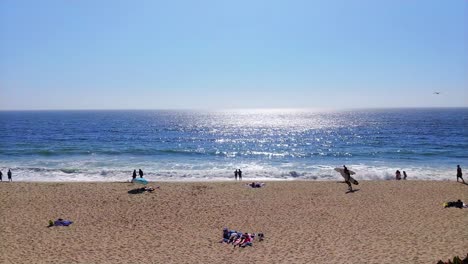 waves and sand with people beautiful californian landscape, half moon bay, pillar point, california