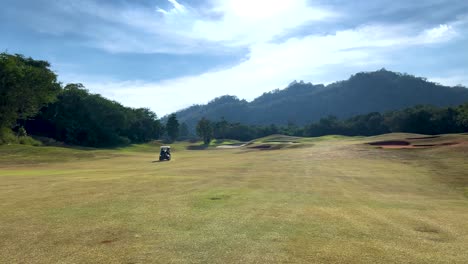 golf course with mountains