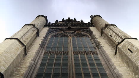 bottom up timelapse shot of old town marekerk church in leiden city during cloudy da,netherlands