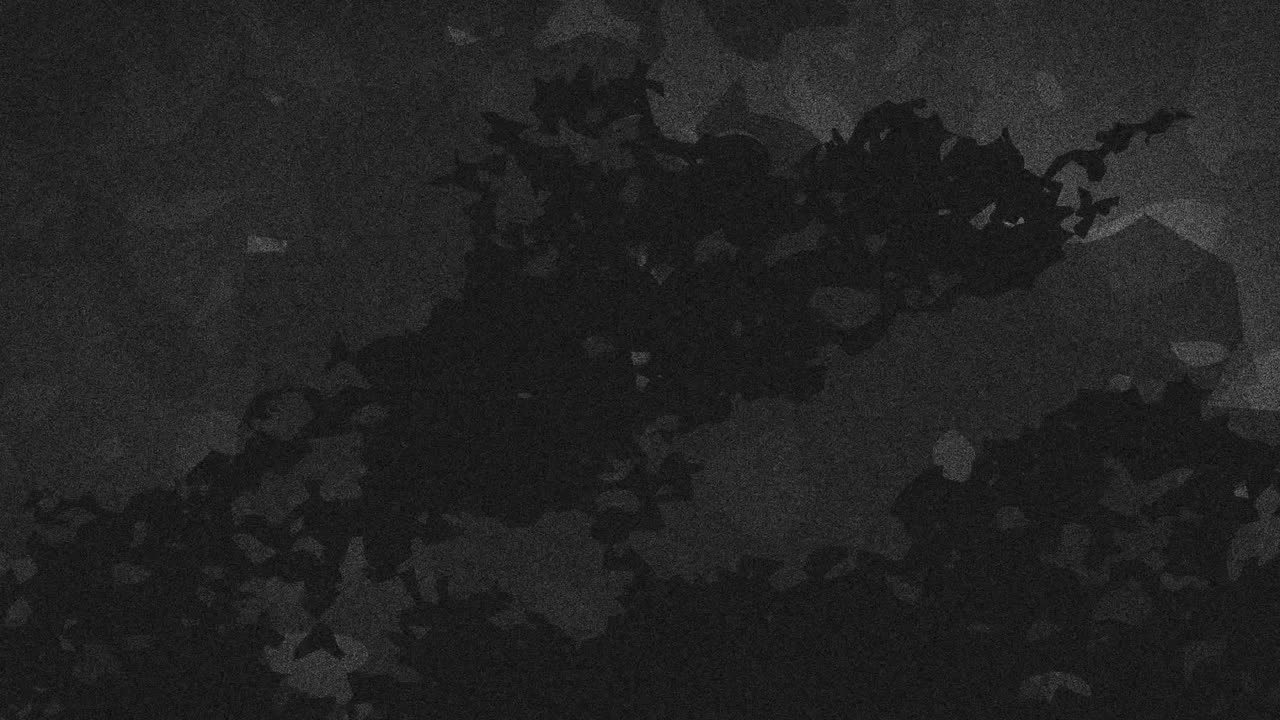 animación de chispas y formas negras sobre un fondo gris