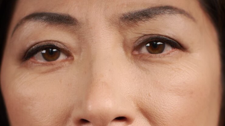 Middle Aged Woman Stares Directly into Camera Portrait