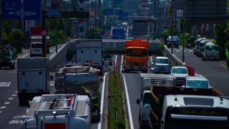 a timelapse of the traffic jam at the urban street in tokyo long shot