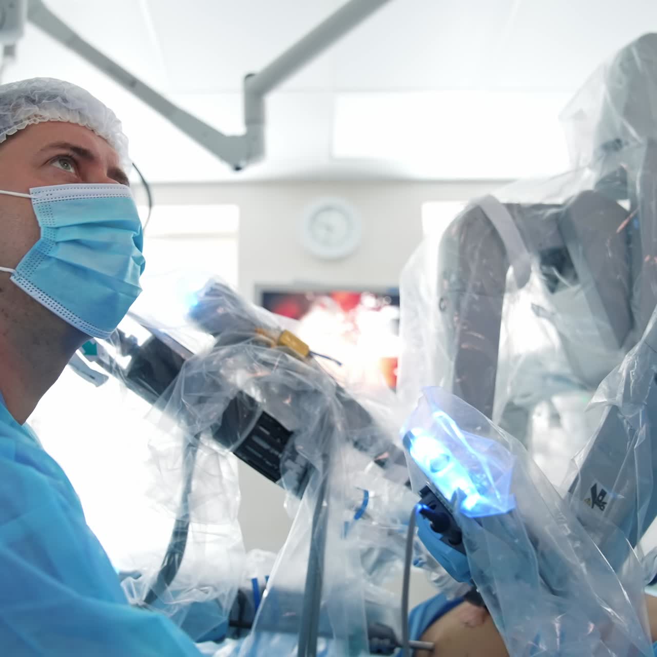 Operating in minimally invasive surgery. Automation of da Vinci machine in operating room and doctors surgery in futuristic hospital