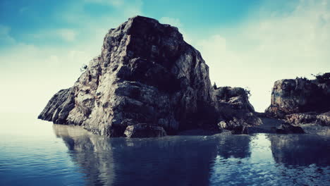 rocky tropical island in ocean