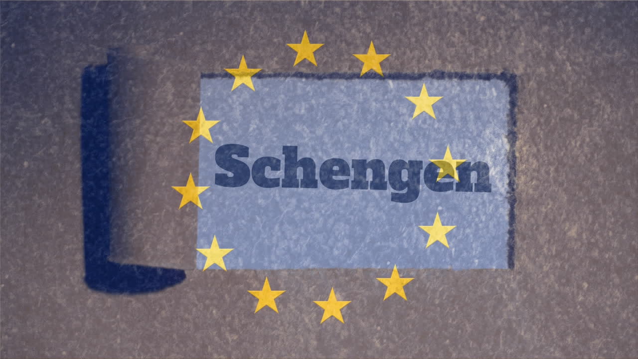 노란색 별들이 종이 위의  ⁇ 겐 문자에 반대로 원으로 회전합니다.