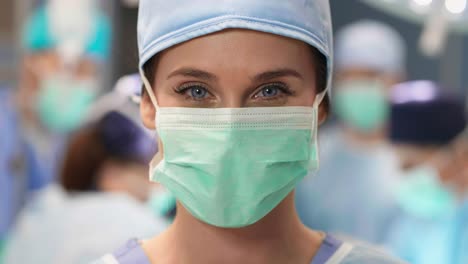 Portrait-of-female-surgeon-at-operating-room