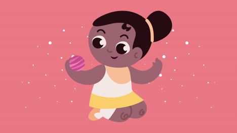 a little girl playing with a ball