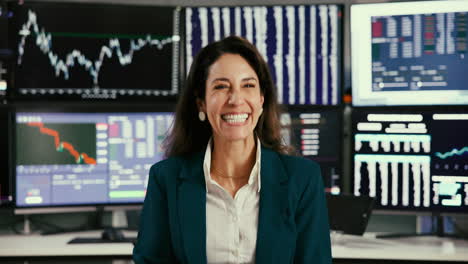 excited businesswoman celebrating success in trading room