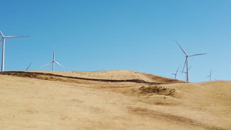 windmills up close in slow-motion in california
