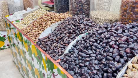 selection of dried dates fruit on market stall in quetta, balochistan