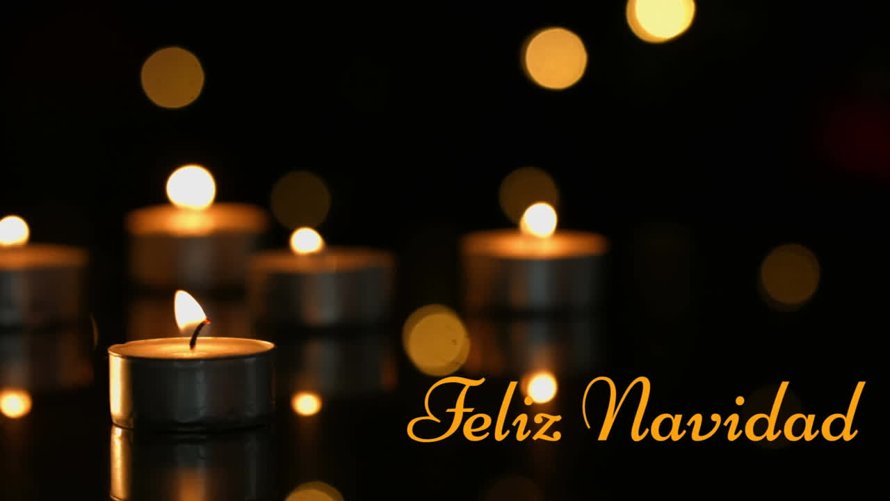 Animazione del testo "Feliz Navidad" su candele