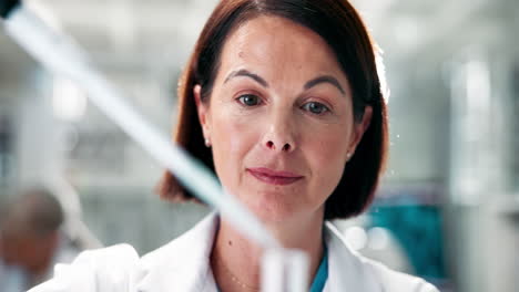 a woman scientist in a laboratory conducting research