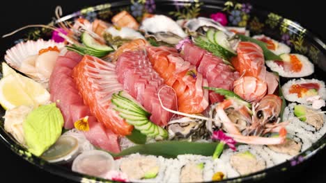 a rotating display of a lavish sushi assortment