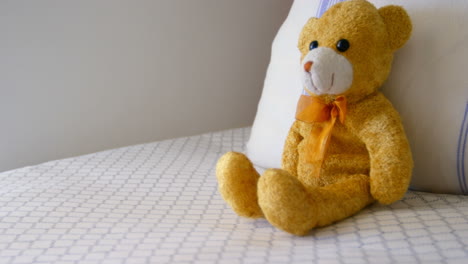 teddy bear on bed in bedroom at home 4k