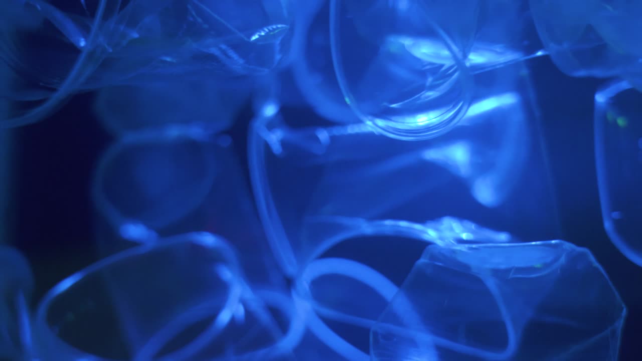 Bottle falling down loop of slow motion in background.Save take care of the world.Video 4K Resolutions.