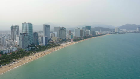 View-of-the-beach,-ocean-and-the-city-of-Nha-Trang,-Vietnam