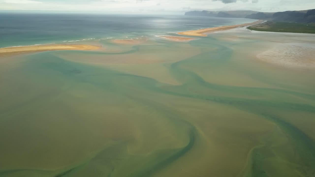 Aerial View of Tidal Patterns on a Coastline