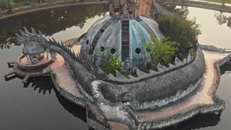 big dragon at thuy tien lake abandoned water park vietnam, aerial