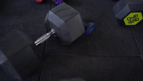 view of dumbbells in a gym, high angle shot