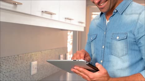 Man-using-his-tablet