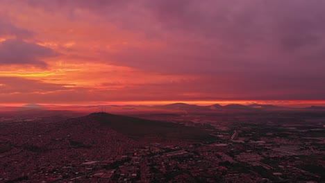 drone : timelapse shot of guadalajara city and el cerro del cuatro at sunrise