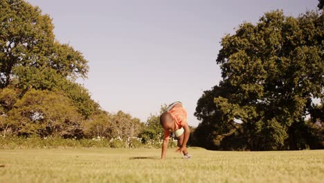 little boy doing acrobatics