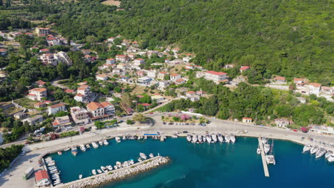 aerial view of poros port, boats and waterfront village in kefalonia island, scenic greek harbor in summer