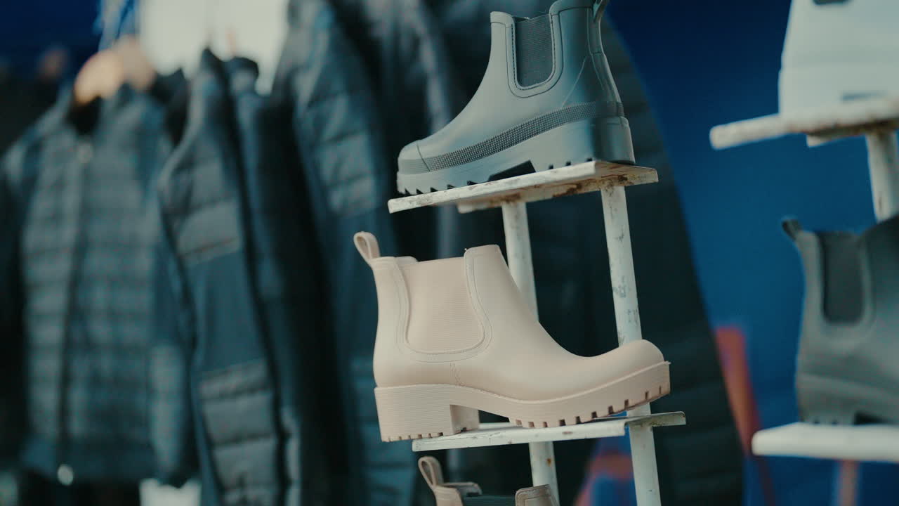 Close-up shot of equestrian shoes and clothing, highlighting style and comfort for riders.