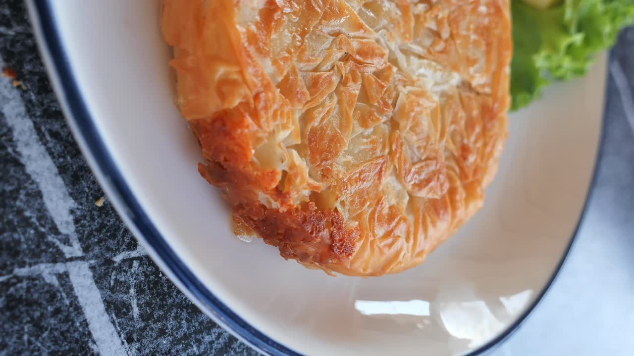 Byrek with cheese and salad