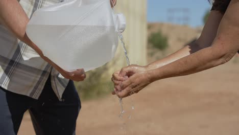 Washing-of-arms-and-hands-with-plastic-canister