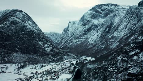 aerial over the wintry landscape near voss, norway