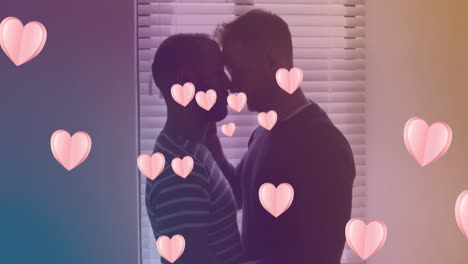 다양한 동성애 커플이 포옹하는 다양한 동성애 커플의 심장 아이콘의 애니메이션