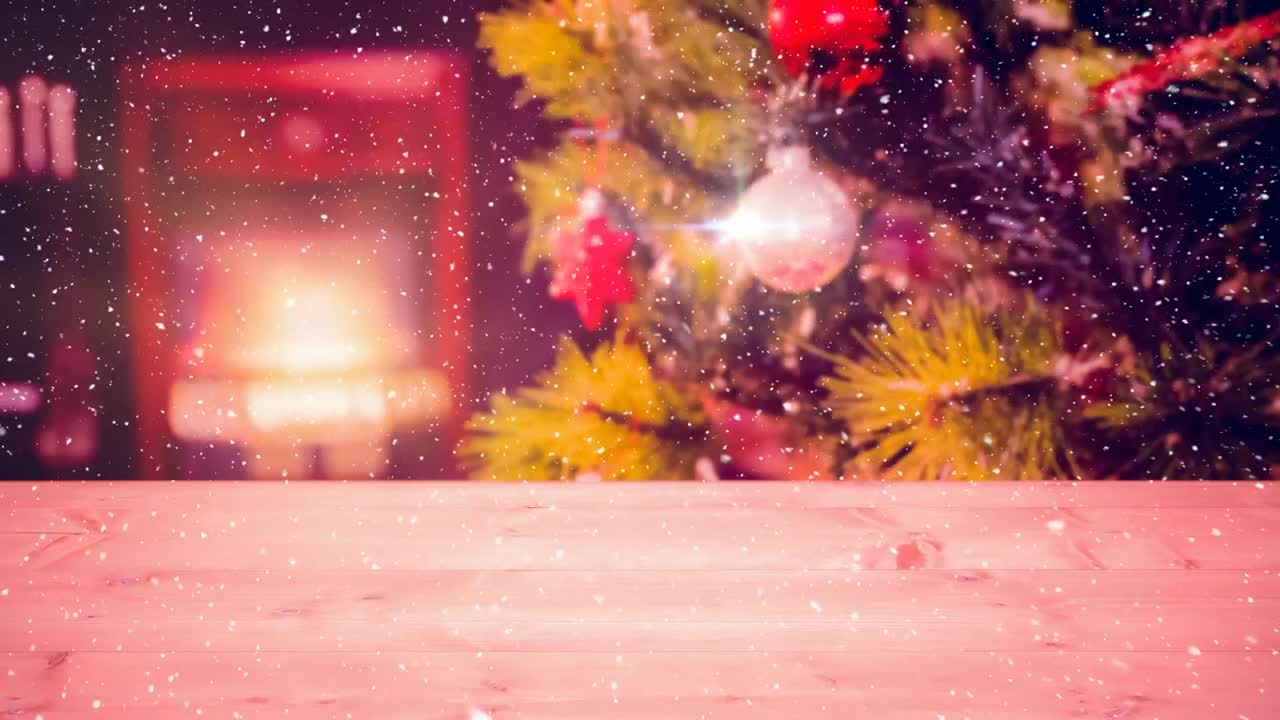 Nieve cayendo con hogar navideño
